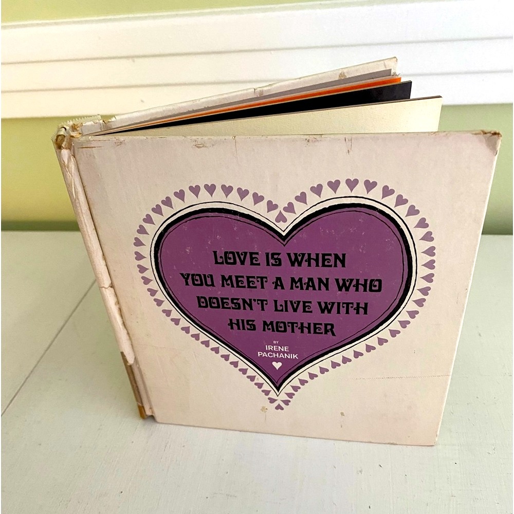 Vintage Book “Love is when you meet a man who doesn’t live with their mother”